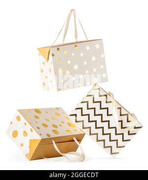 Composition of falling gift paper boxes isolated on white background. Stock Photo