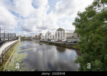 Riga, Latvia. August 2021.  view of the buildings of the Riga Central Market and the Pilsetas canal in the city center Stock Photo