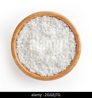 Coconut flakes in wooden bowl isolated on white background with clipping path Stock Photo