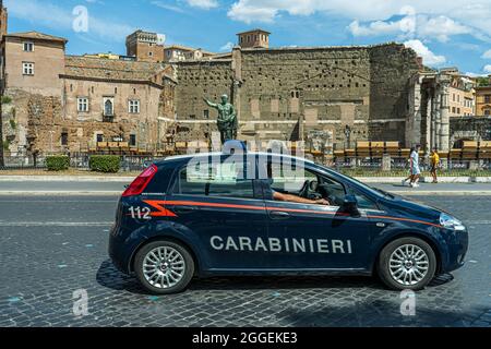 ROME, ITALY. 31 August, 2021. A Carabinieri car patrols the via dei fori imperiali in Rome. The Italian health ministry has announced iti will scrap the five-day quarantine for travellers from the UK  who are fully vaccinated and show a negative covid-19 test from 31 AugustCredit: amer ghazzal/Alamy Live News Stock Photo