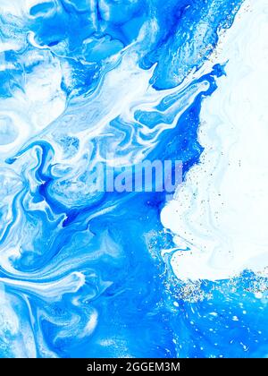Blue creative abstract hand painted background with silver glitter, marble texture, abstract ocean, acrylic painting on canvas. Modern art. Contempora Stock Photo