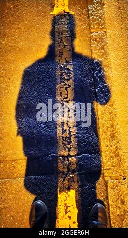 Self-portrait or selfie of my own shadow on the street Stock Photo