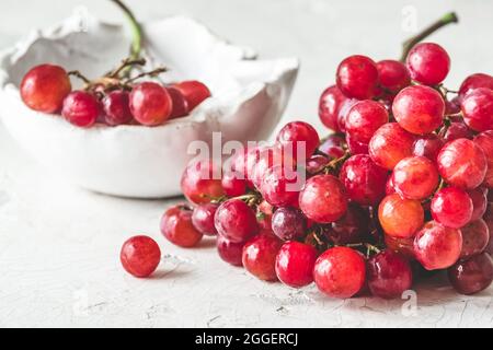 Fresh ripe red grapes on white background Stock Photo