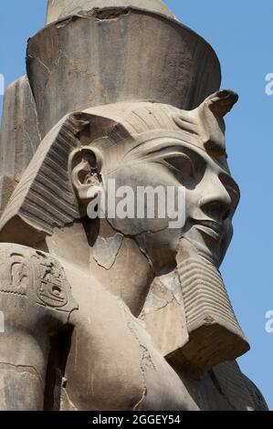 The temple of Luxor. The main entrance to the temple complex was originally flanked by six colossal statues of Ramses Stock Photo