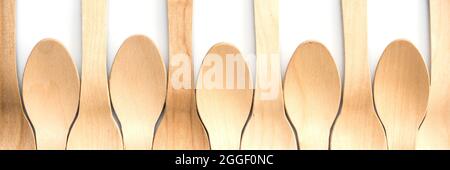 Wooden spoon composition on white background Stock Photo