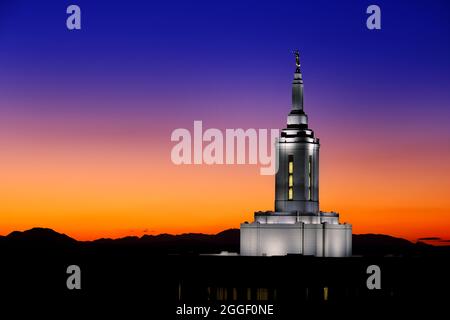 Pocatello Idaho LDS Mormon Latter-day Saint Temple with lights at sunset Angel Moroni Stock Photo