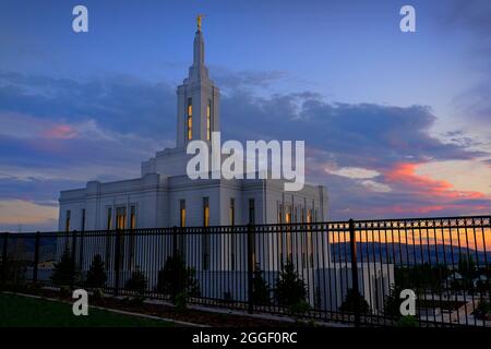 Pocatello Idaho LDS Mormon Latter-day Saint Temple with lights at sunset Angel Moroni Stock Photo