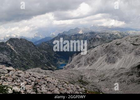 Slovenia, a view of Lepena valley from Mount Krn (monte Nero Italian) They were scene of bloody battles between the Alpini and the Kaisejager during the WWI.  Krnsko jezero lake in the valley. Stock Photo