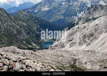 Slovenia, a view of Lepena valley from Mount Krn (monte Nero Italian) They were scene of bloody battles between the Alpini and the Kaisejager during the WWI.  Krnsko jezero lake in the valley. Stock Photo