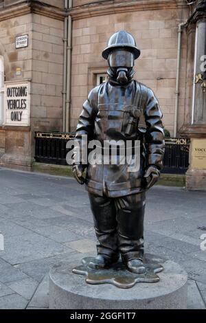 Citizen Firefighter memorial by sculptor Kenny Hunter, Hope Street,Glasgow city centre, Scotland,UK Stock Photo