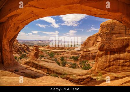 Summer day viewed from Tower Arch in Arches National Park Stock Photo