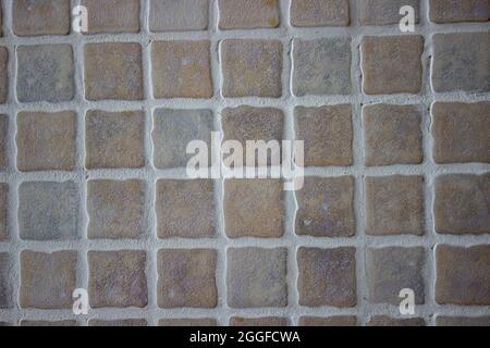 Red and grey stone tiled wall texture Stock Photo