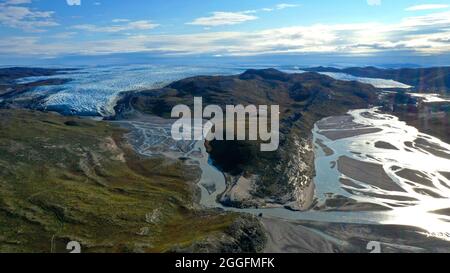 Aerial view of the Russell Glacier near Kangerlussuaq in Greenland which is melting due global warming climate change retreat shrink shrinking recede Stock Photo