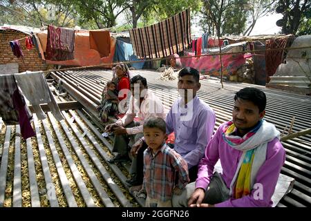 A general view of a slum area near Shakurbasti Railway station in New Delhi, India. This slum is situated on the railway's land. Stock Photo