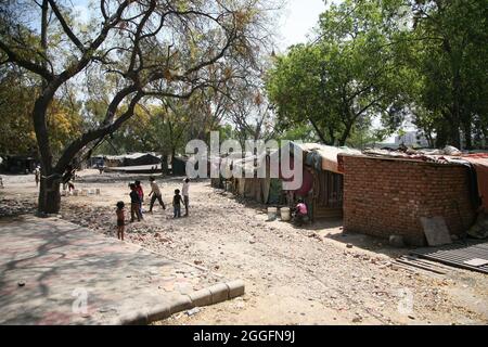 A general view of a slum area near Shakurbasti Railway station in New Delhi, India. This slum is situated on the railway's land. Stock Photo