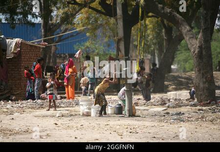 A general view of a slum area near Shakurbasti Railway station in New Delhi, India. This slum is situated on the railway's land. Stock Photo