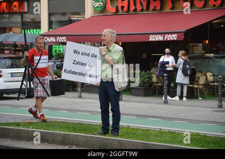 Lateral thinker demonstration against 'compulsory vaccination' -  Schlossstrasse in Steglitz, Berlin, Germany - August 31, 2021. Stock Photo