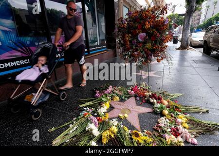 Los Angeles, California, USA. 31st Aug, 2021. Flowers and a wreath are placed at the star of late actor Edward Asner on the Hollywood Walk of Fame, Tuesday, Aug. 31, 2021, in Los Angeles. Edward Asner, who became a star in middle age as the gruff but lovable newsman Lou Grant in both the television comedy ''The Mary Tyler Moore Show'' and the drama ''Lou Grant, '' died on Sunday at 91. (Credit Image: © Ringo Chiu/ZUMA Press Wire) Stock Photo