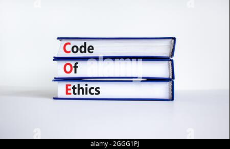 COE, Code of ethics symbol. Concept words 'COE, Code of ethics' on books on a beautiful white background. Business and COE, code of ethics concept. Co Stock Photo