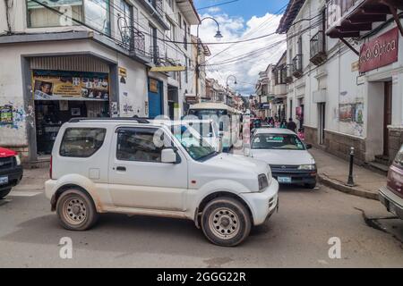 SUCRE, BOLIVIA - APRIL 22, 2015: Traffic in the center of Sucre, capital of Bolivia Stock Photo