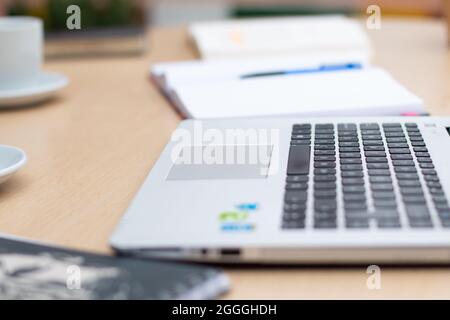 wooden study table, with office supplies, pencil, laptop, Stock Photo