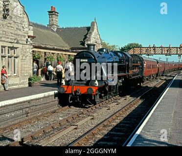 Locomotive (LMS Stainer Mogul number 2968) along station platform, Severn Valley Railway, Bridgnorth, Shropshire, England, UK, Western Europe. Stock Photo