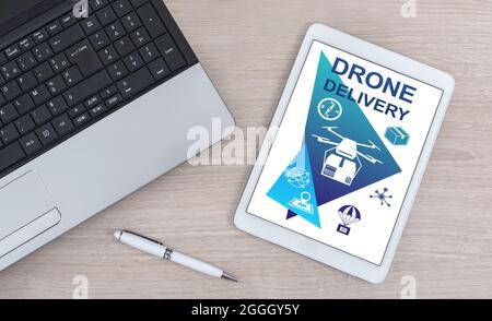 Drone delivery concept shown on a digital tablet Stock Photo