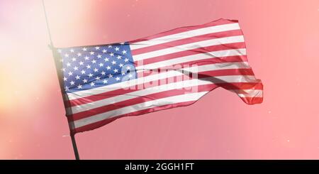 11 September USA Patriot's Day USA Patriot's Day background on the American flag.The flag of the United States of America flutters in the winds in the Stock Photo