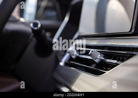 interior air duct on the front panel of a premium car. close up, side view Stock Photo
