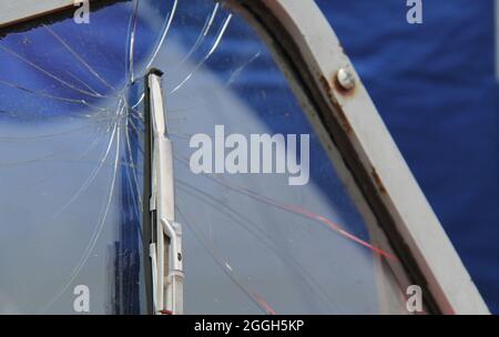 A Broken Smashed Windscreen on an Old Vintage Car. Stock Photo