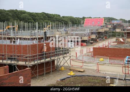 Construction of a large housing development in Milton Keynes. Traditional brick construction. Stock Photo
