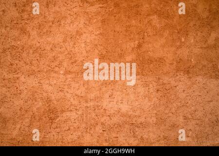 Terracotta wall rustic background or texture Stock Photo