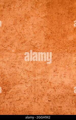 Terracotta wall rustic background or texture Stock Photo