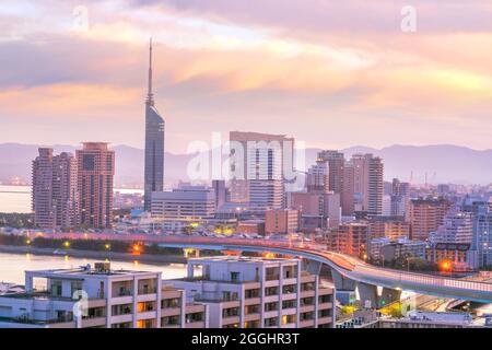 Fukuoka city skyline in Japan at sunset Stock Photo