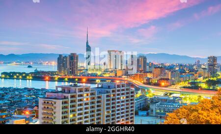 Fukuoka city skyline in Japan at sunset Stock Photo