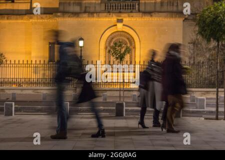 People walking on an elegant boulevard in the Central Bucharest neighborhood. Stock Photo