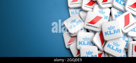 Logos of the merged airlines Air France and KLM on a heap. Copy space. Web banner format. Stock Photo