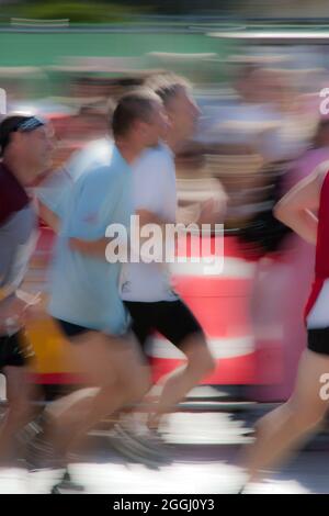 Semiabstract picture of runners with motion blur Stock Photo