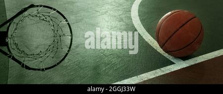 orange obsolete basketball on green floor with curve white line and hoop with net sport banner background Stock Photo