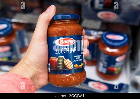 Tyumen, Russia-june 08, 2021: Sauce Barilla, the most famous pasta Italian brand. Buying products in a hypermarket Stock Photo