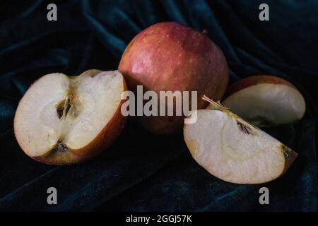 Sliced apple on the couch Stock Photo