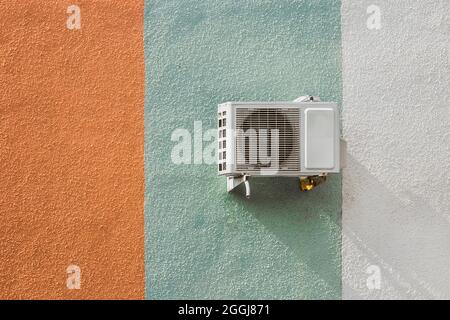 Air conditioning on the wall of the facade of a city house. Stock Photo