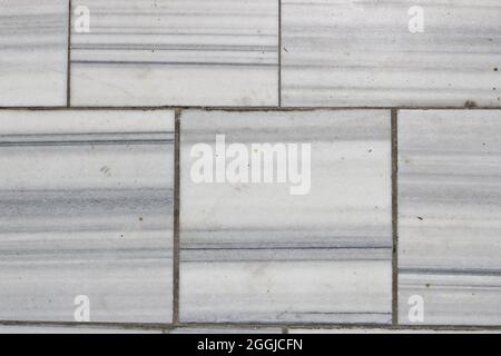 Natural marble texture - pavement paved with marble slabs. Marble background. Stock Photo