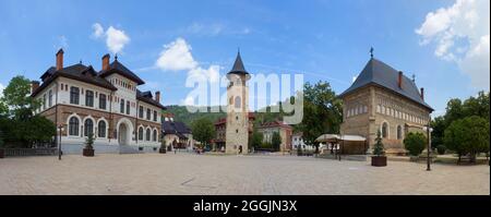 Museum of Arts, Stephen the Great's Tower and Royal Court's Birth of Saint John the Baptist Church in the Central Plaza of Piatra Neamt. Stock Photo