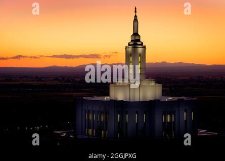 Pocatello Idaho LDS Mormon Latter-day Saint Temple with lights at sunset Angel Moroni Stock Photo