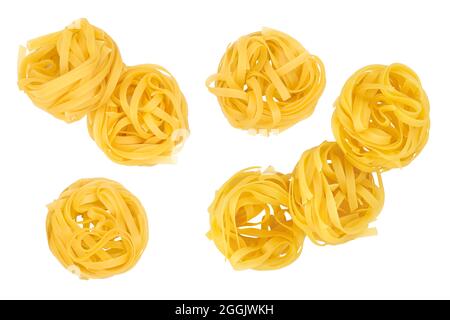 Raw tagliatelle pasta isolated on white background. Top view. Flat lay. Set or collection Stock Photo