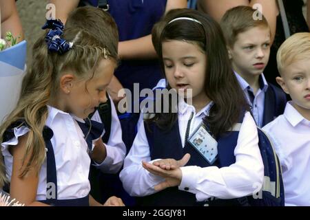 ODESA, UKRAINE - SEPTEMBER 1, 2021 - First formers are pictured during the Knowledge Day celebration marking the start of the new academic year at Spe Stock Photo