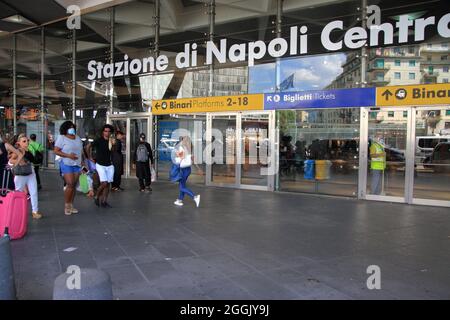 Entry into force of the possession of the green pass (certification of vaccination against covid-19) on long-distance trains. On the instructions of Interior Minister Lamorgese, to avoid protests of no-vax and no-green passes, all major Italian railway stations are manned by a large number of police forces . At the station of Naples closed all the various accesses. One access only for the entrance and one only for the exit from the station. Travelers forced to a long walk from the parking lot to the entrance and exit area. I've seen a lot of police and financial police officers. (Photo by Pas Stock Photo