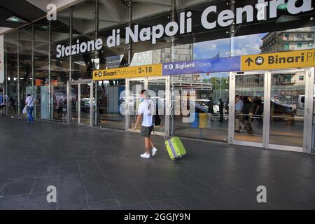 Entry into force of the possession of the green pass (certification of vaccination against covid-19) on long-distance trains. On the instructions of Interior Minister Lamorgese, to avoid protests of no-vax and no-green passes, all major Italian railway stations are manned by a large number of police forces . At the station of Naples closed all the various accesses. One access only for the entrance and one only for the exit from the station. Travelers forced to a long walk from the parking lot to the entrance and exit area. I've seen a lot of police and financial police officers. (Photo by Pas Stock Photo