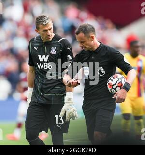 London, UK. 29th Aug, 2021. Crystal Palace Goalkeeper Vicente Guaita speaks to referee Stuart Attwell during the Premier League match between West Ham United and Crystal Palace at the London Stadium, Queen Elizabeth Olympic Park, London, England on 28 August 2021. Photo by Ken Sparks. Editorial use only, license required for commercial use. No use in betting, games or a single club/league/player publications. Credit: UK Sports Pics Ltd/Alamy Live News Stock Photo